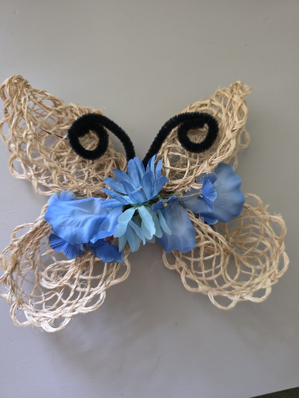 Vintage Hand Made  Butterfly Wall Hanging with blue flowers